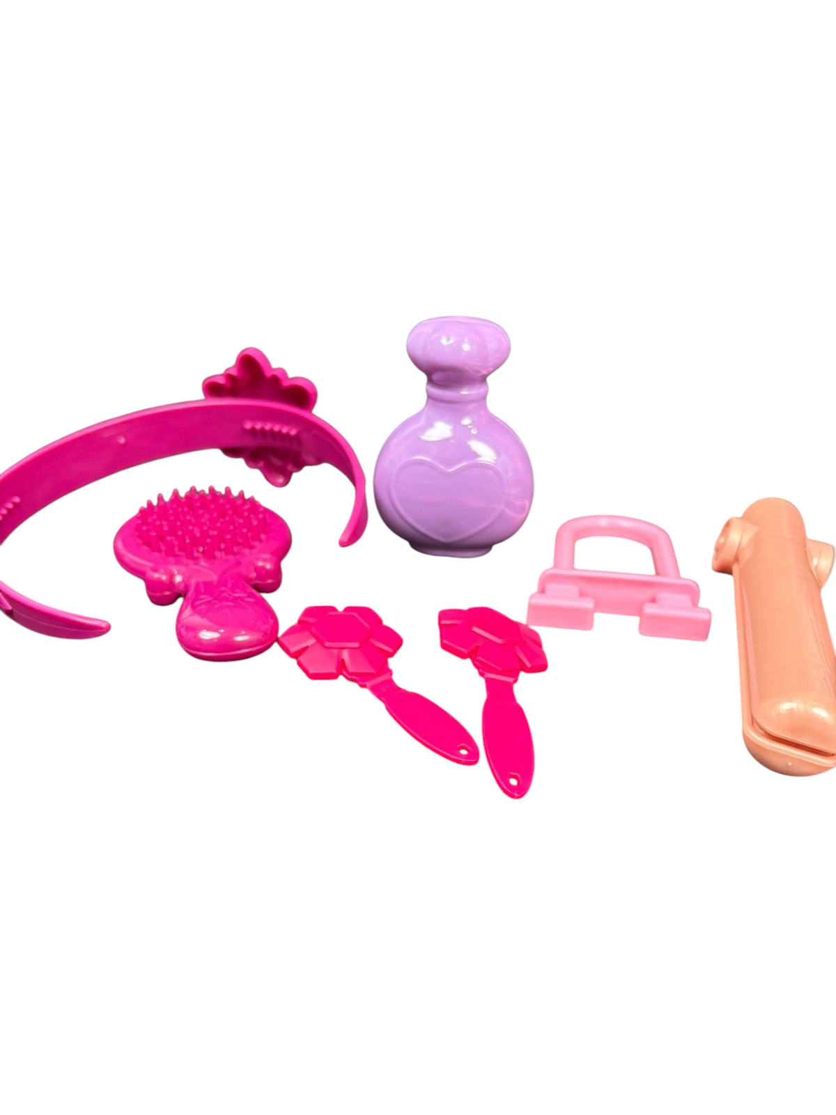 Accesorios de maquillaje EASY STORE para niñas, incluye cepillo, diadema y frascos de plástico en tonos rosa y lila.